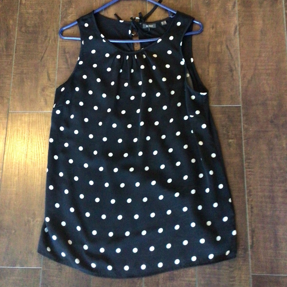 Ladies sleeveless black top with off white polka dots. Sz 12/42